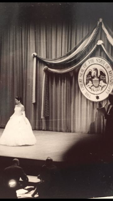 Virginia Faye Wing competes in the evening gown competition in the Miss Mississippi Pageant in the Vicksburg Municipal Auditorium in Vicksburg, Mississippi on August 1, 1959. 